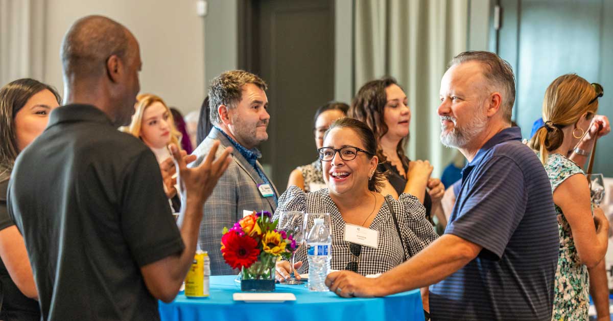 group of professionals networking at an event